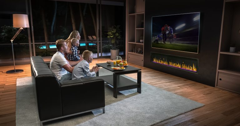 A family is watching a soccer moment on the TV and celebrating a goal, sitting on the couch in the living room. The living room is made in 3D.